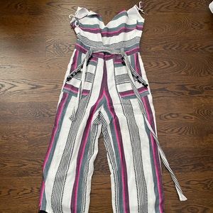 Purple pink and white striped jumpsuit